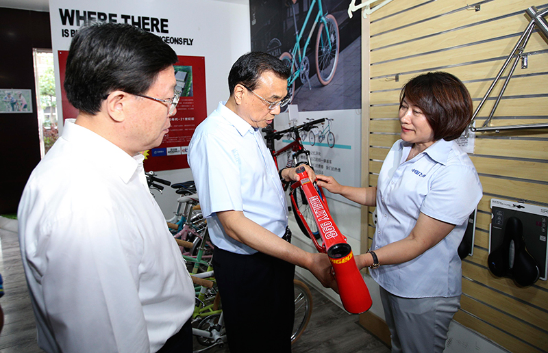 李克強體驗“飛鴿”:我愿為中國自行車做廣告