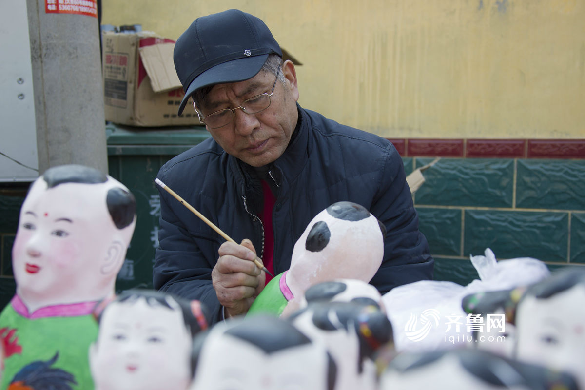 感受非遺文化 山東火把李廟會泥塑娃娃當主角[組圖]