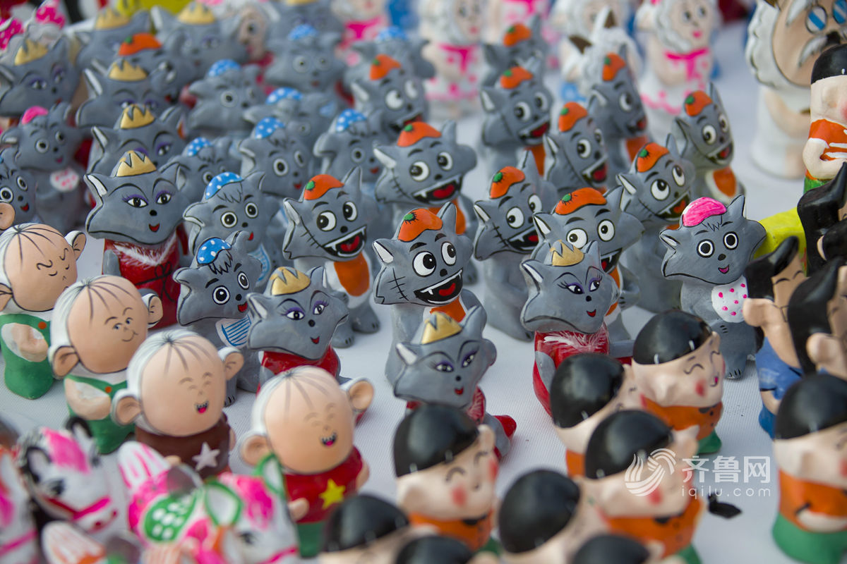 感受非遺文化 山東火把李廟會泥塑娃娃當(dāng)主角[組圖]