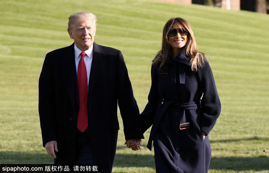 特朗普又來秀恩愛了 與第一夫人白宮草坪手牽手
