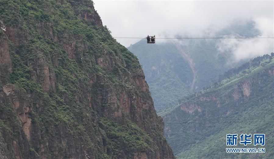 大橋飛架 天塹變通途——金沙江告別“溜索時代”