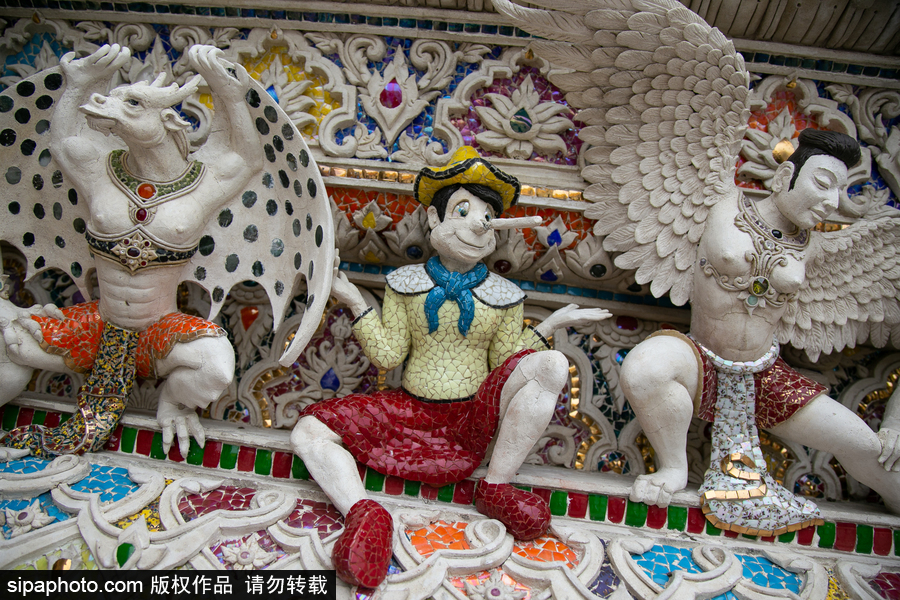 泰國曼谷一廟宇驚現超人、皮卡丘等動漫雕像 跨界裝飾創意無窮！