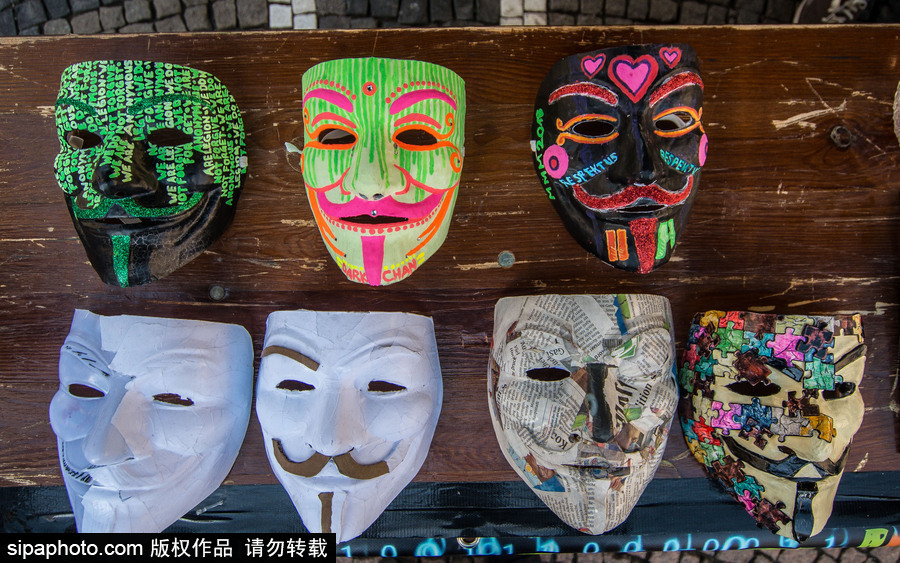 英國：蓋伊·?？怂怪暝俣热紵“偃f面具游行在倫敦舉行